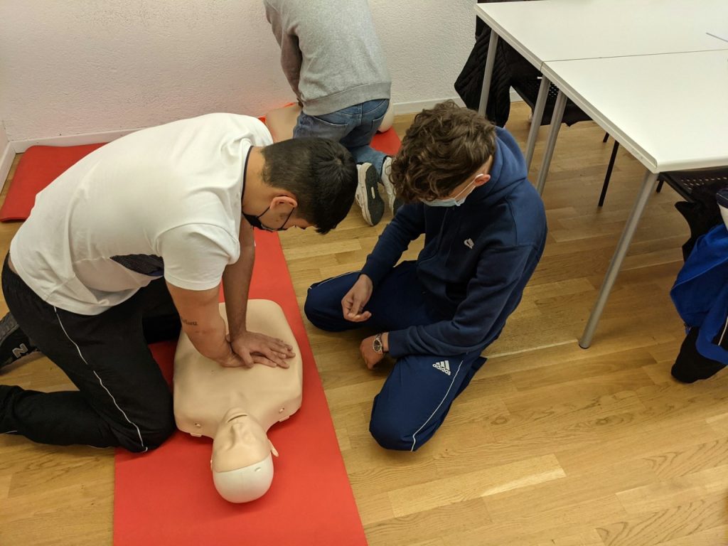 in person CPR training using a mannequin